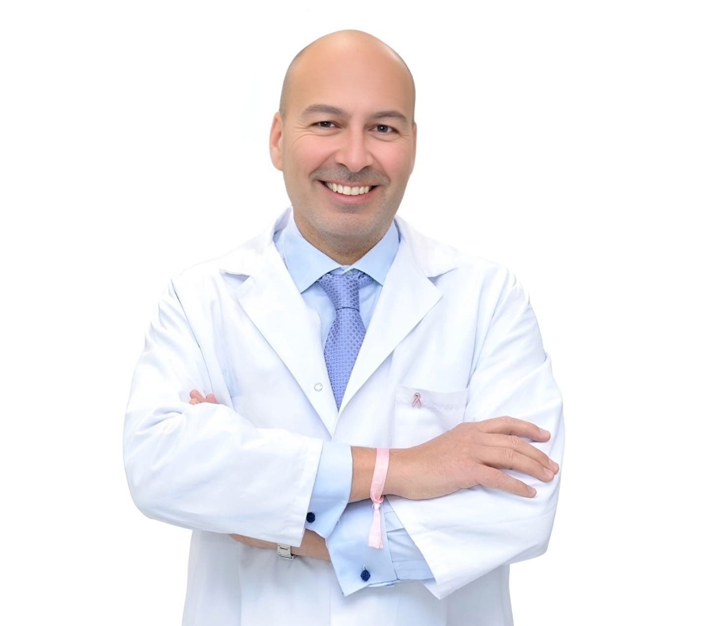 Fotografía del Dr. Moragues, posando con bata y corbata azul.